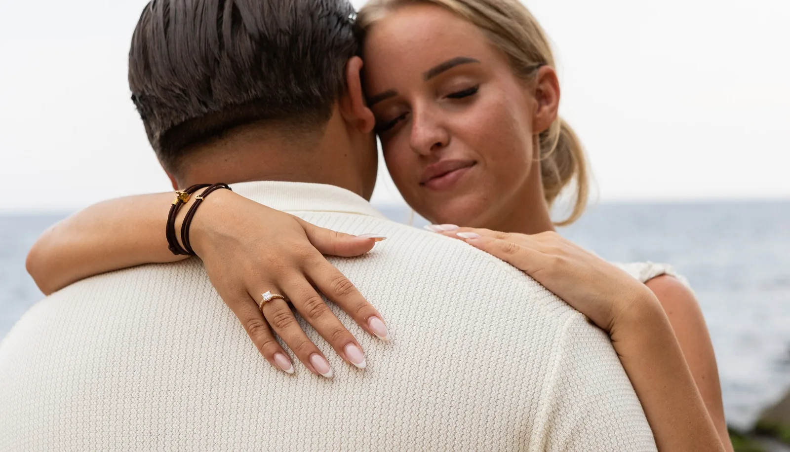 Couple embracing after saying yes
